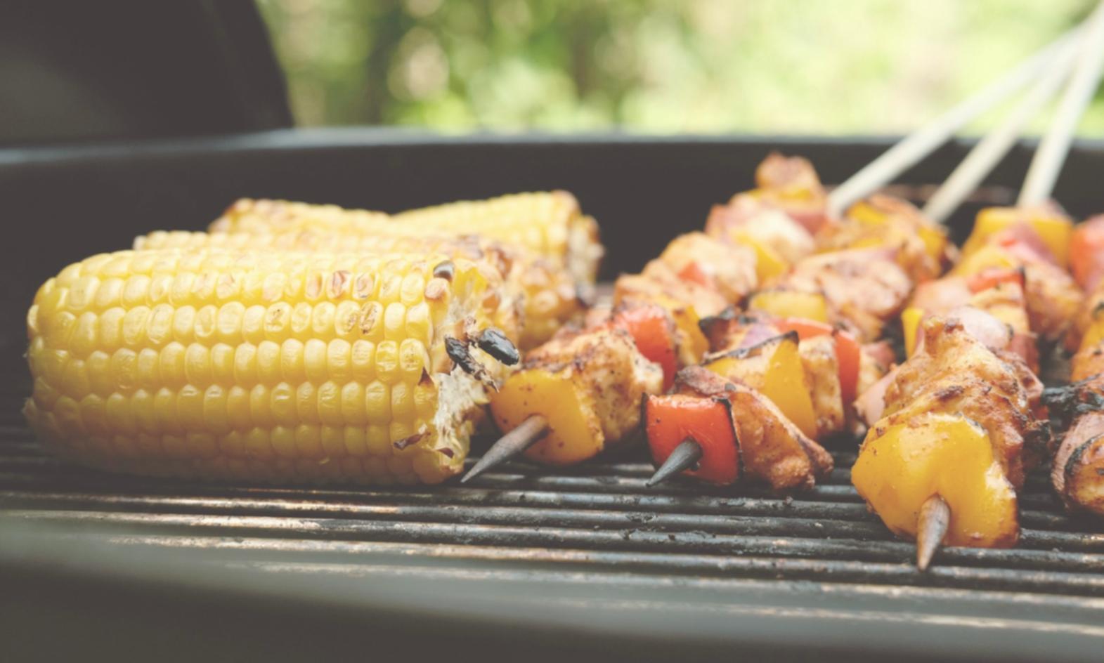 Students learning seasonal pizza preparation techniques in professional kitchen