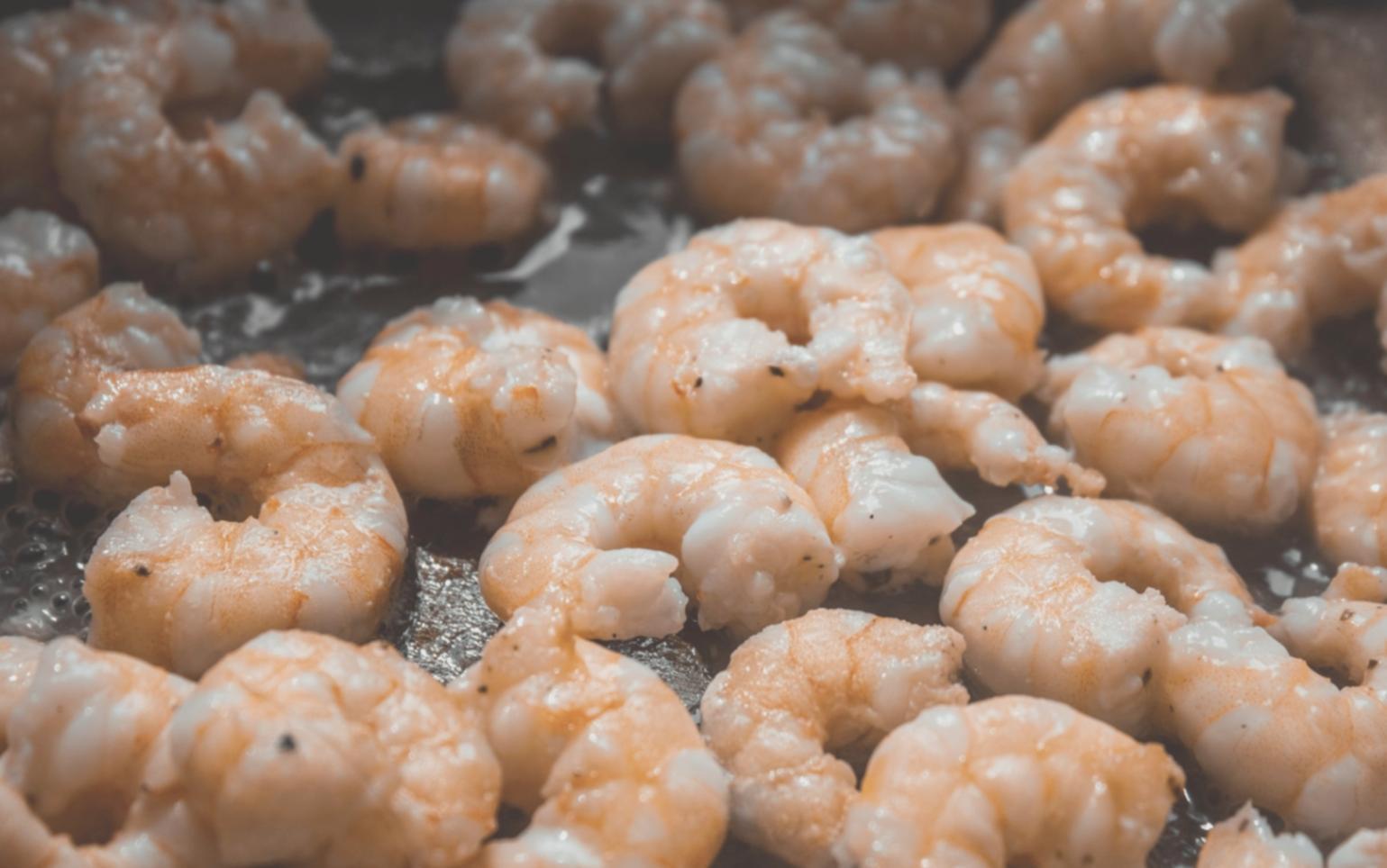 Fresh seasonal ingredients being prepared in kitchen